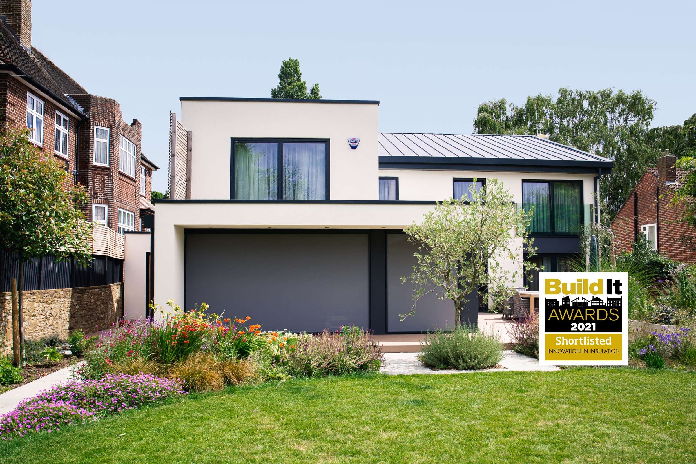 External blinds on a modern property. The weather a bright and sunny with blue sky.