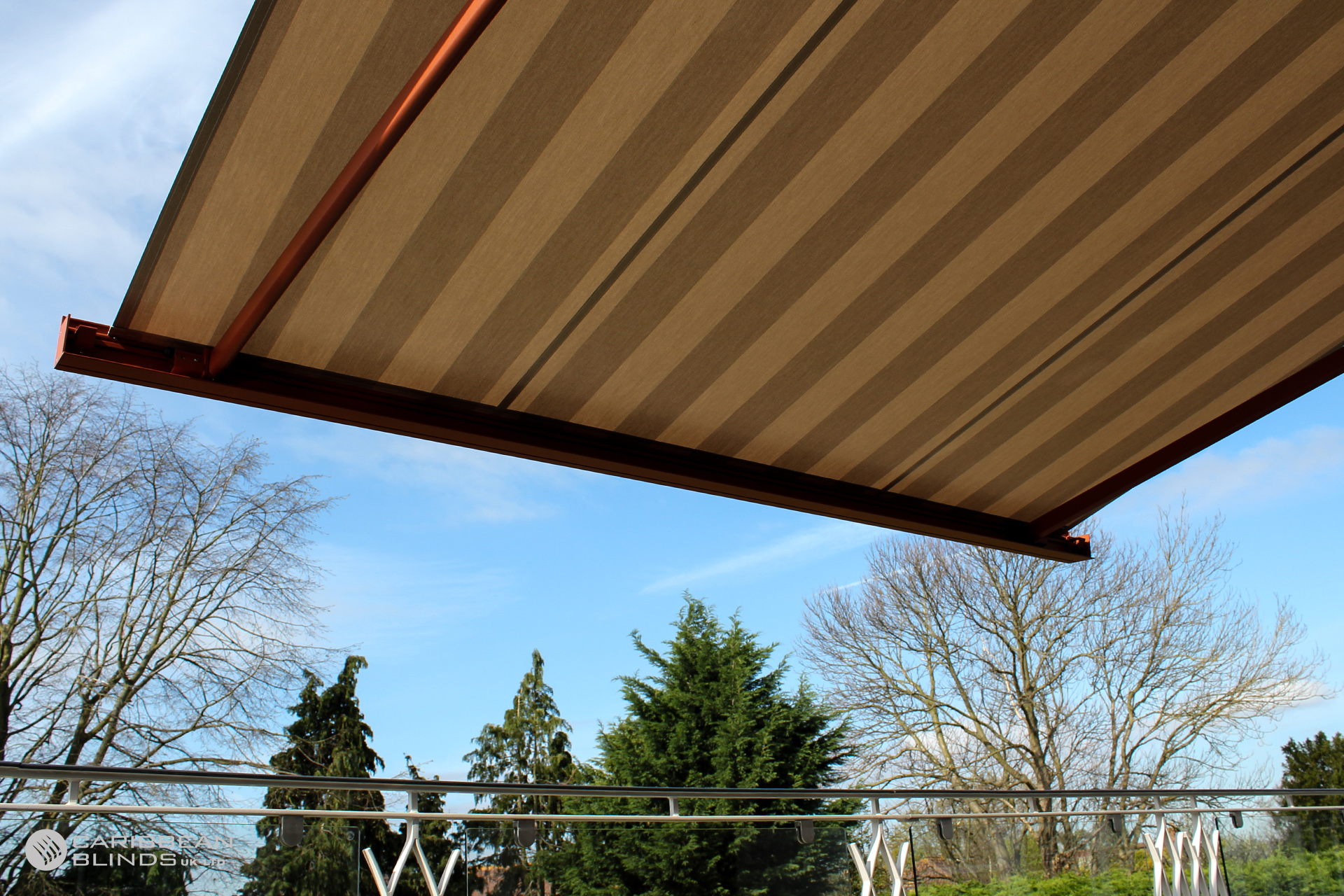 https://www.cbsolarshading.co.uk/app/uploads/2023/08/CB-Cuba-Patio-Awning-Terracotta-2.jpg